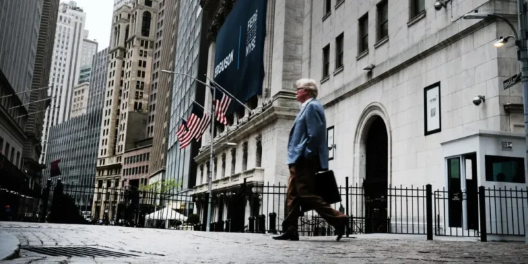 Dow rises modestly in volatile trading as Wall Street struggles to recover